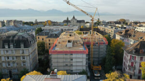 Aufstockung eines Wohnhauses in Lausanne in Holzbauweise