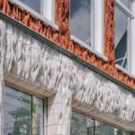 Fassade aus 3D-gedruckten Keramikelementen an einer Luxusboutique in Amsterdam, realisiert von Studio RAP