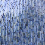 Keramische Fassade aus glasierten Ziegelriemchen in Grau-, Blau- und Grüntonen