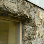 Übergang Beton- zu Metallfassade an einem Einfamilienhaus in Island