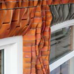 Edelstahlkassetten zur Befestigung 3D-gedruckter Keramikelemente an der Fassade