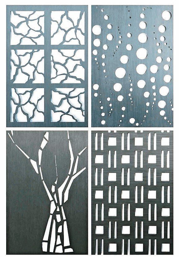 Metallplatten mit ausgefrästen Mustern und Motiven. Bild: Rheinzink