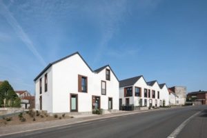 Mehrfamilienhäuser in Billerbeck mit WDVS-Fassade und aufgesetzten Fensterfaschen