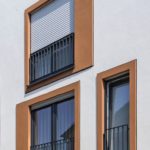 Mehrfamilienhäuser in Billerbeck mit WDVS-Fassade und aufgesetzten Fensterfaschen